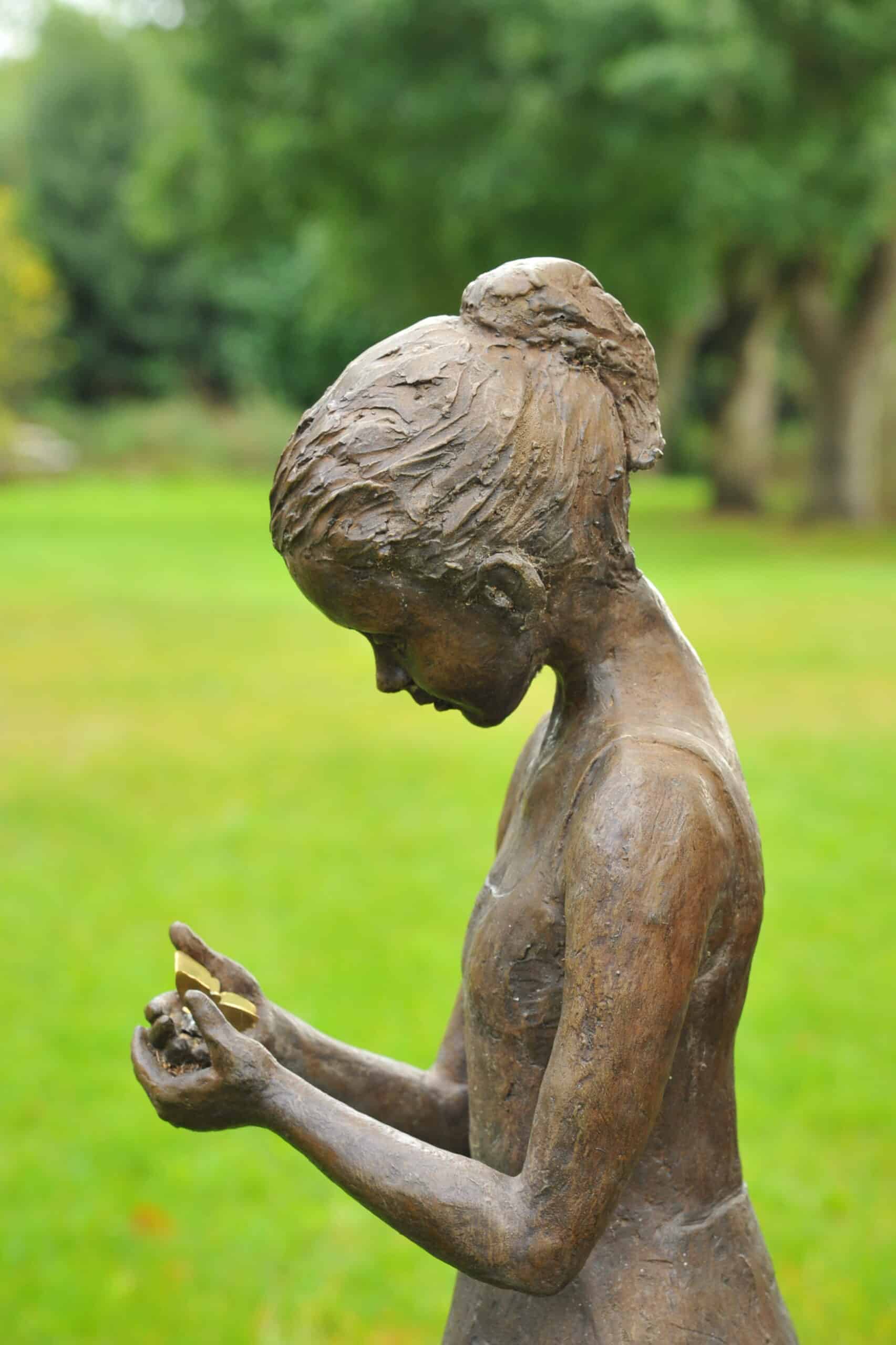 a stunning statue of a young girl