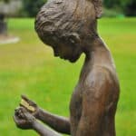 a stunning statue of a young girl