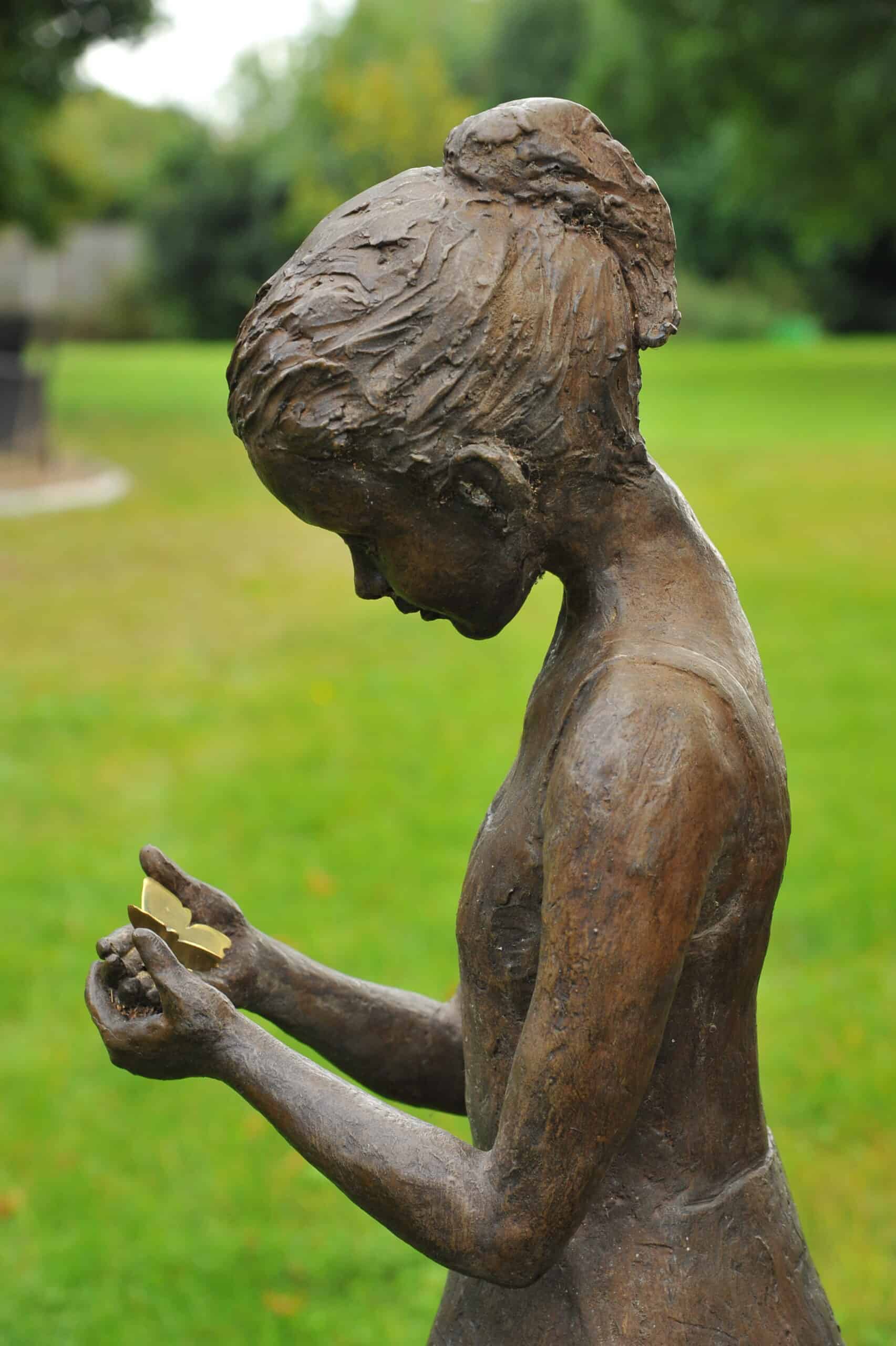 a stunning statue of a young girl