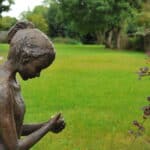 a stunning statue of a young girl