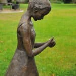 a stunning statue of a young girl