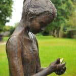 a stunning statue of a young girl