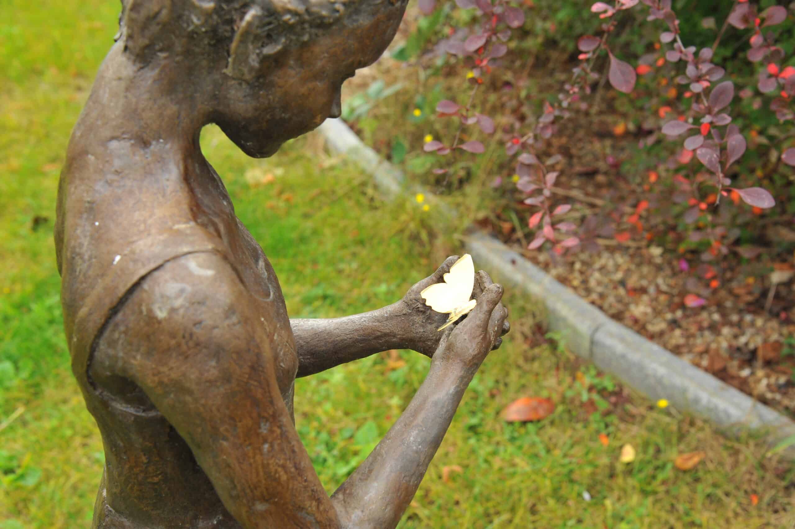 a stunning statue of a young girl
