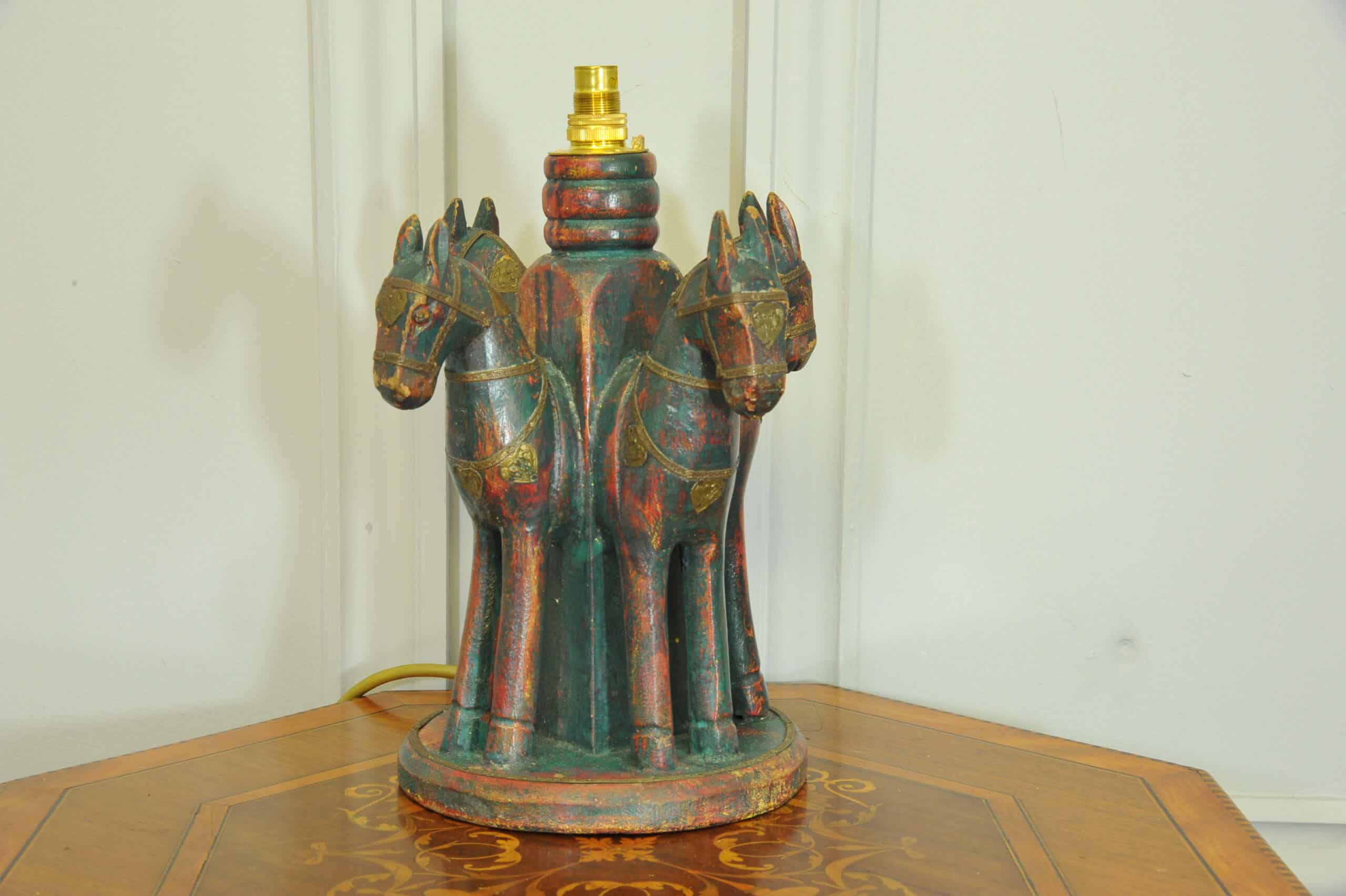 an antique four horse painted table lamp