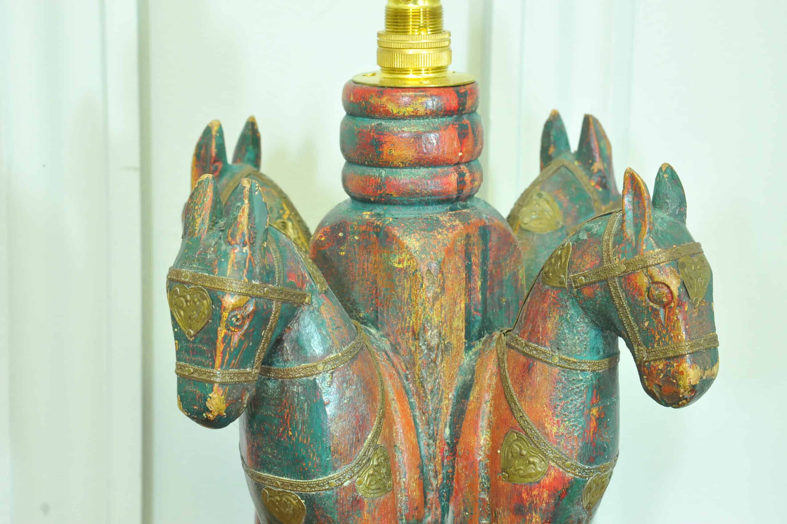 an antique four horse painted table lamp