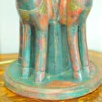 an antique four horse painted table lamp