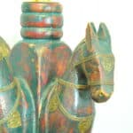 an antique four horse painted table lamp