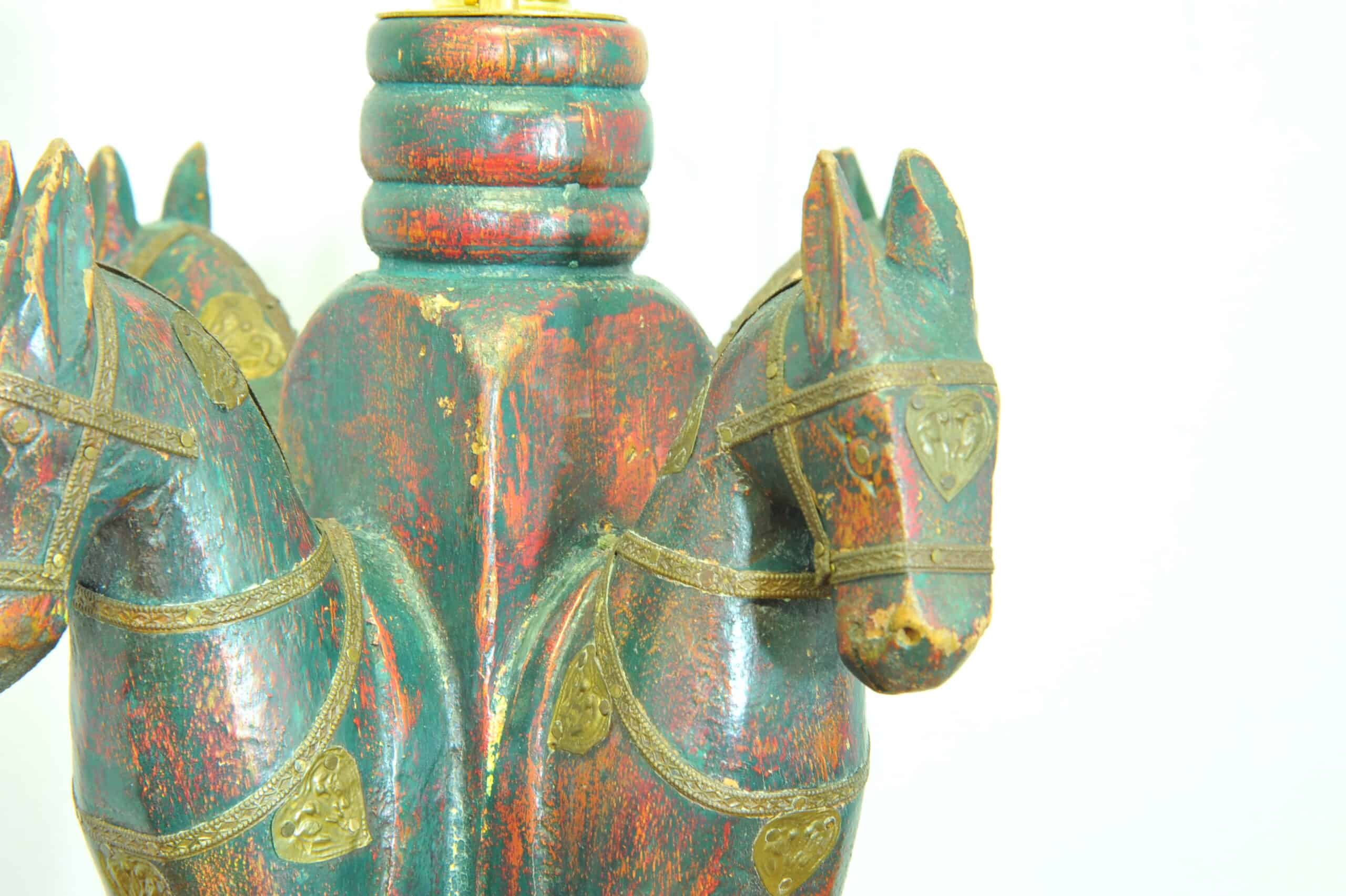 an antique four horse painted table lamp