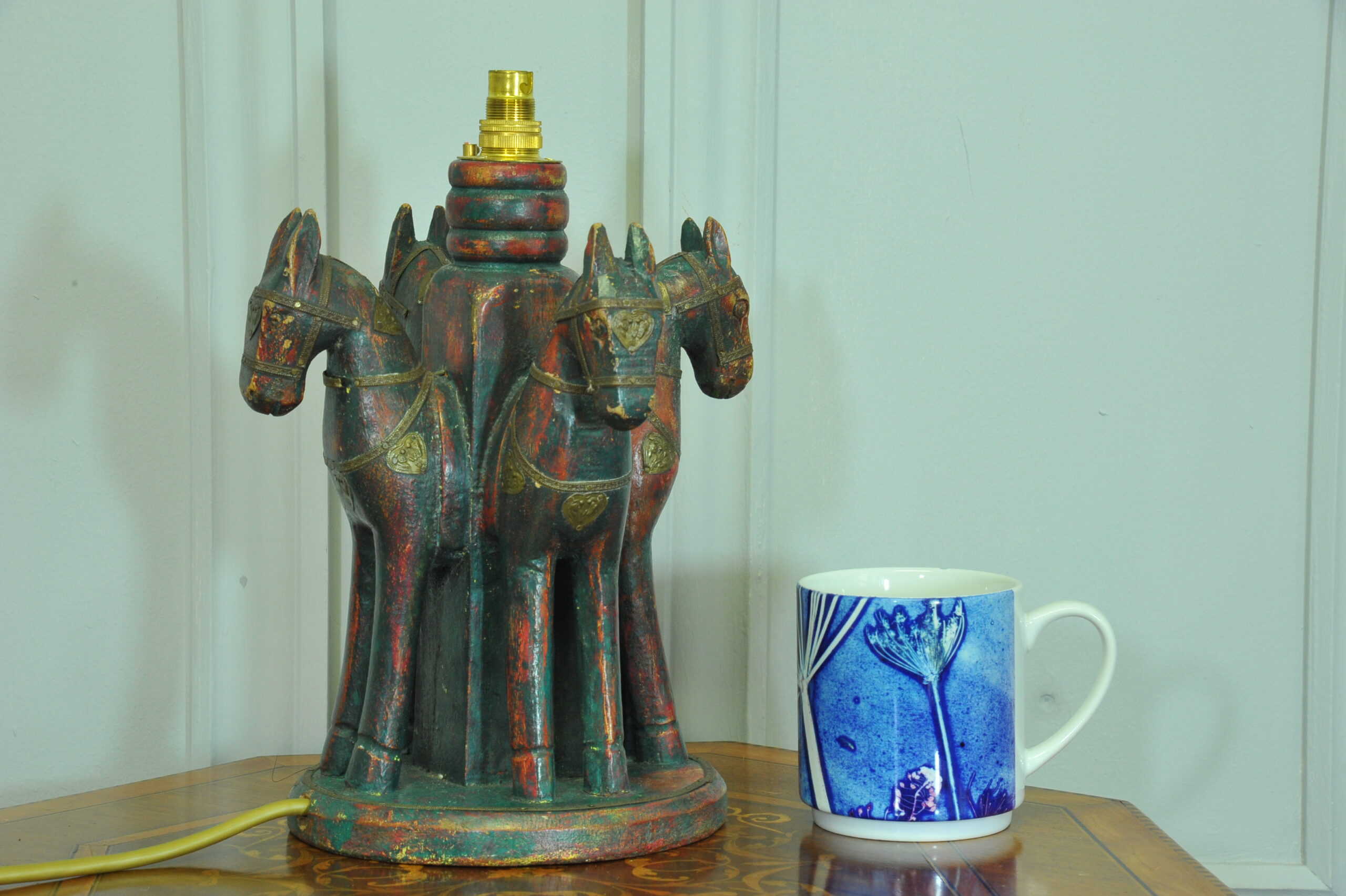 an antique four horse painted table lamp