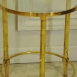 a wonderful pair of vintage maison jansen brass side tables