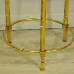 a wonderful pair of vintage maison jansen brass side tables