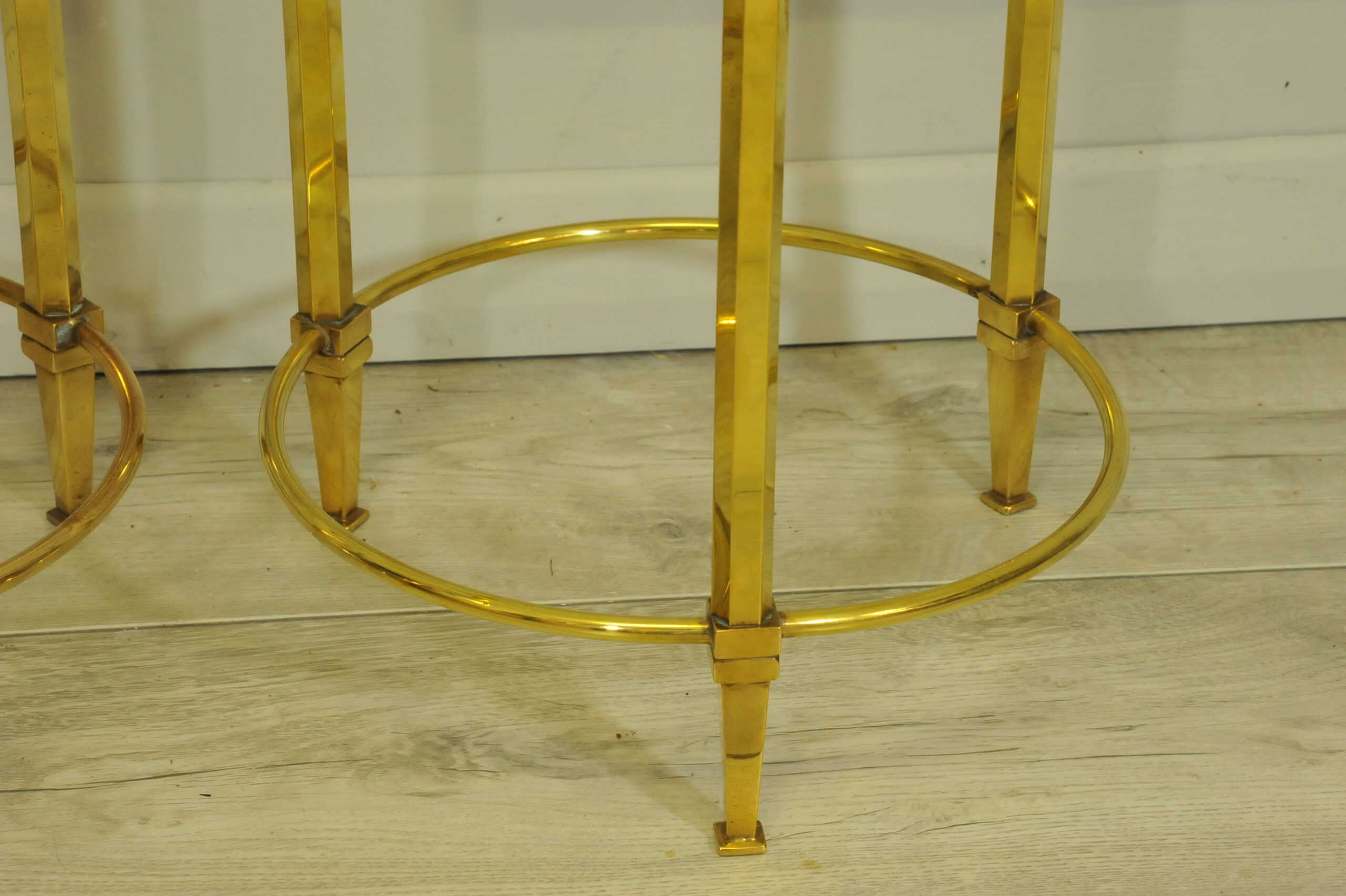 a wonderful pair of vintage maison jansen brass side tables