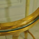 a wonderful pair of vintage maison jansen brass side tables
