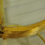 a wonderful pair of vintage maison jansen brass side tables