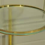a wonderful pair of vintage maison jansen brass side tables