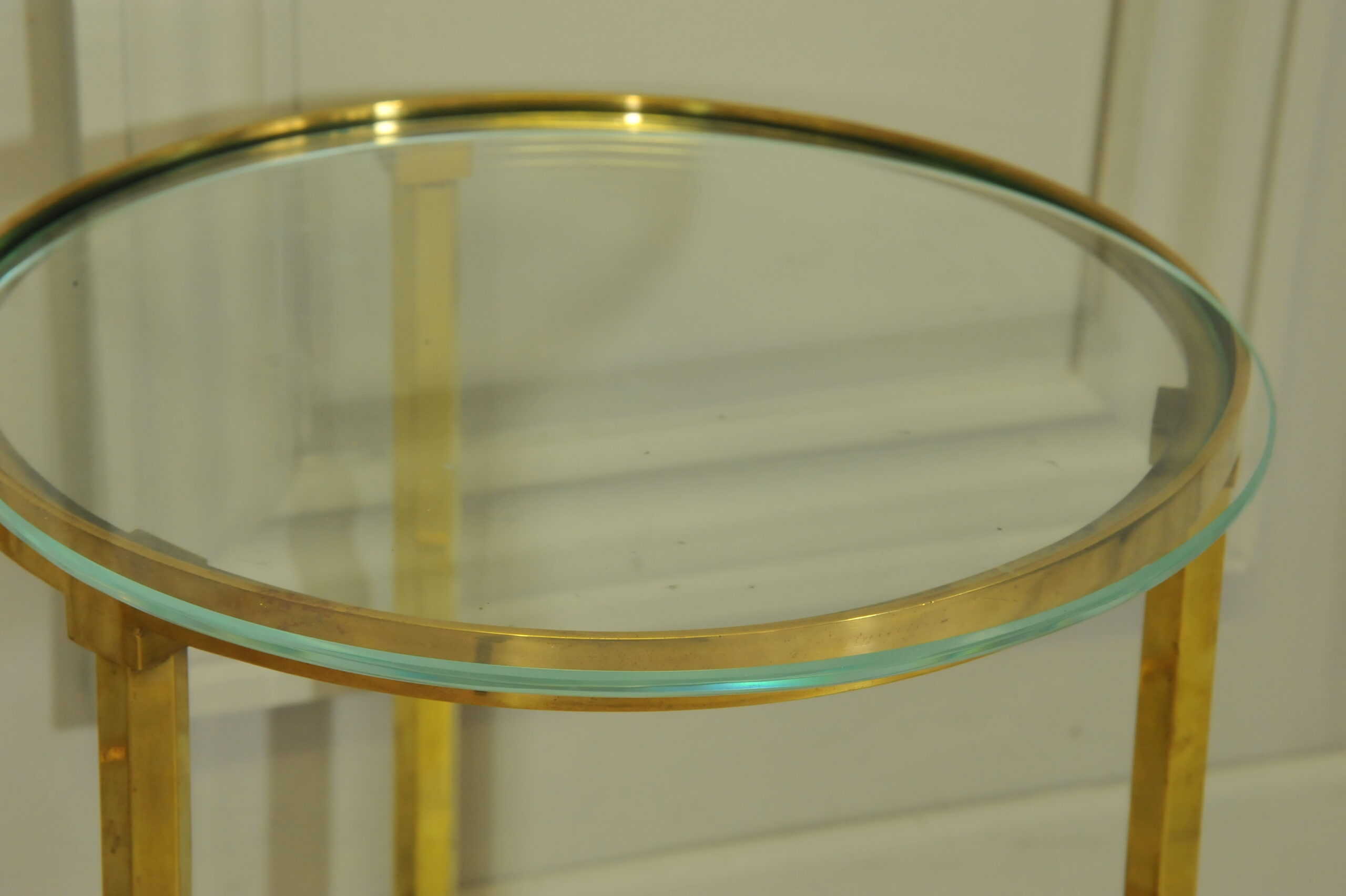 a wonderful pair of vintage maison jansen brass side tables