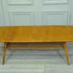 a vintage ercol 398 long coffee table with under shelf