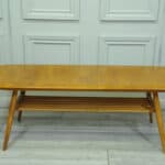 a vintage ercol 398 long coffee table with under shelf