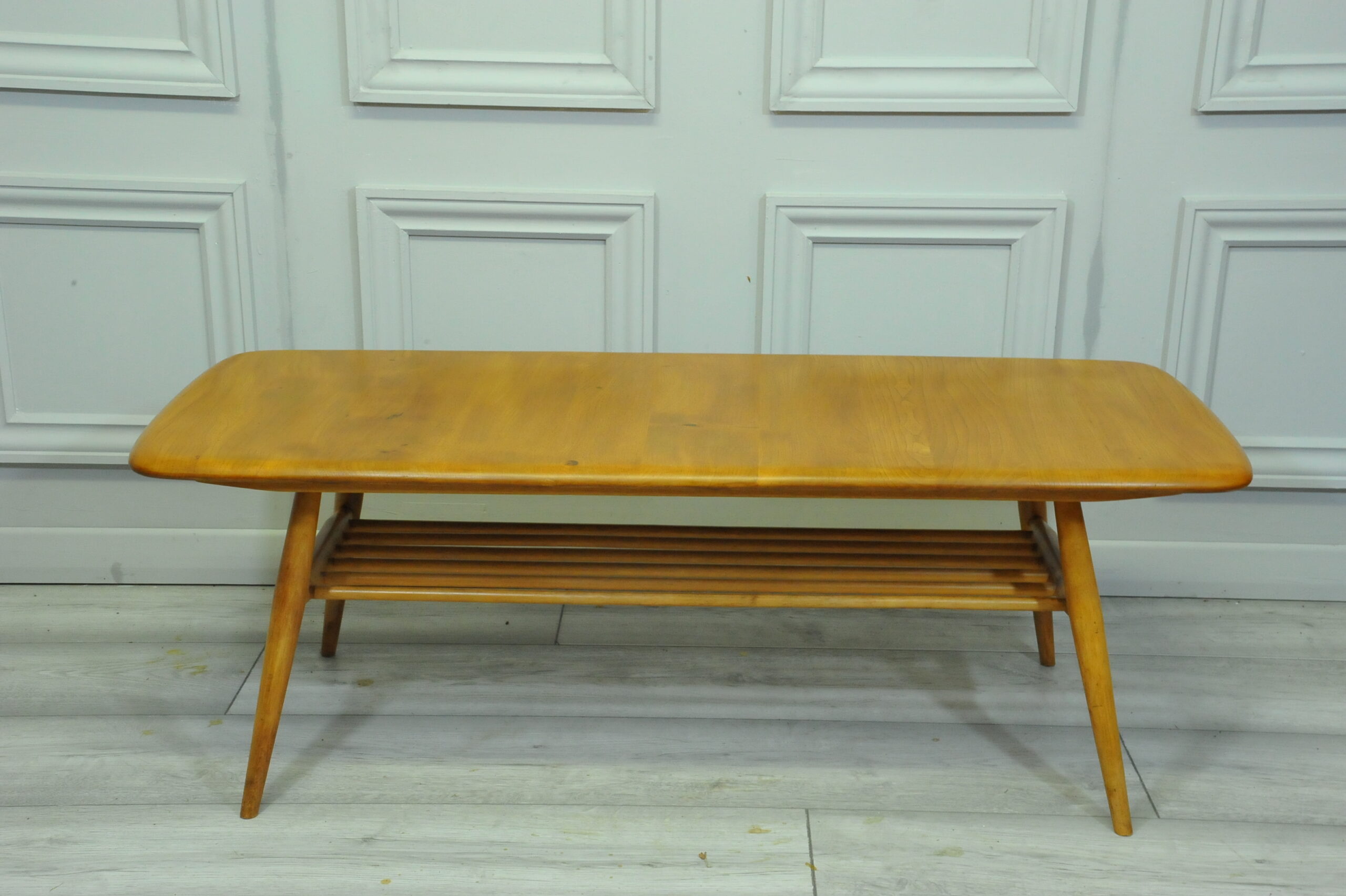 a vintage ercol 398 long coffee table with under shelf