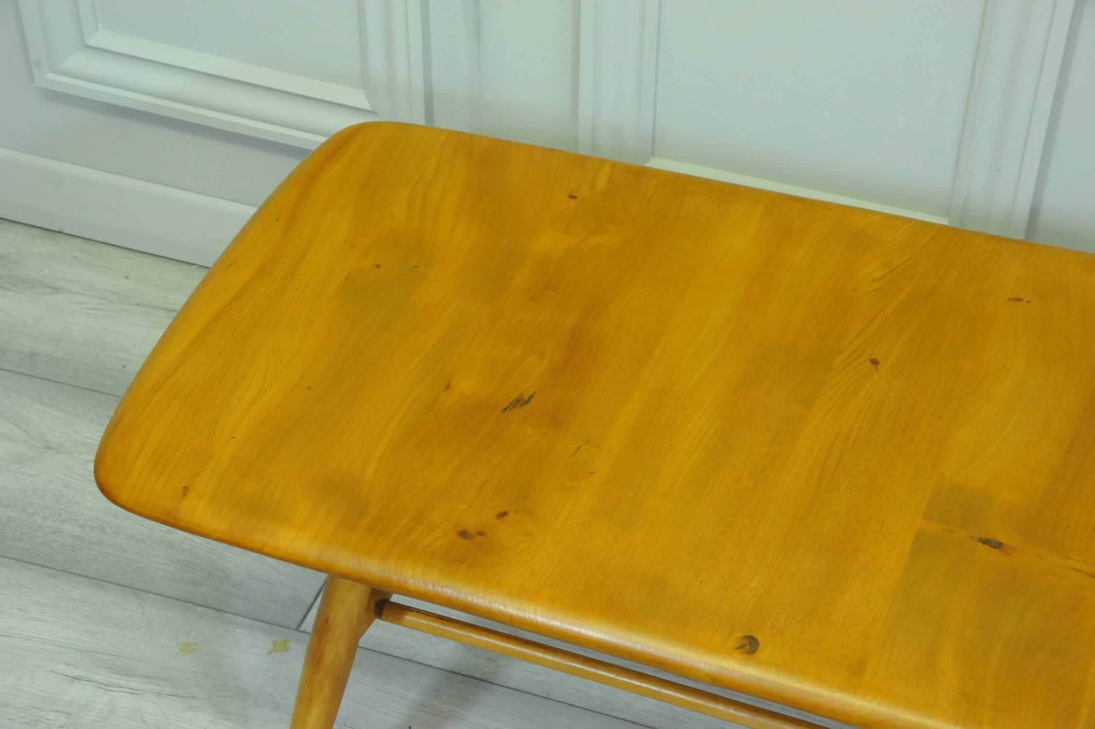 a vintage ercol 398 long coffee table with under shelf
