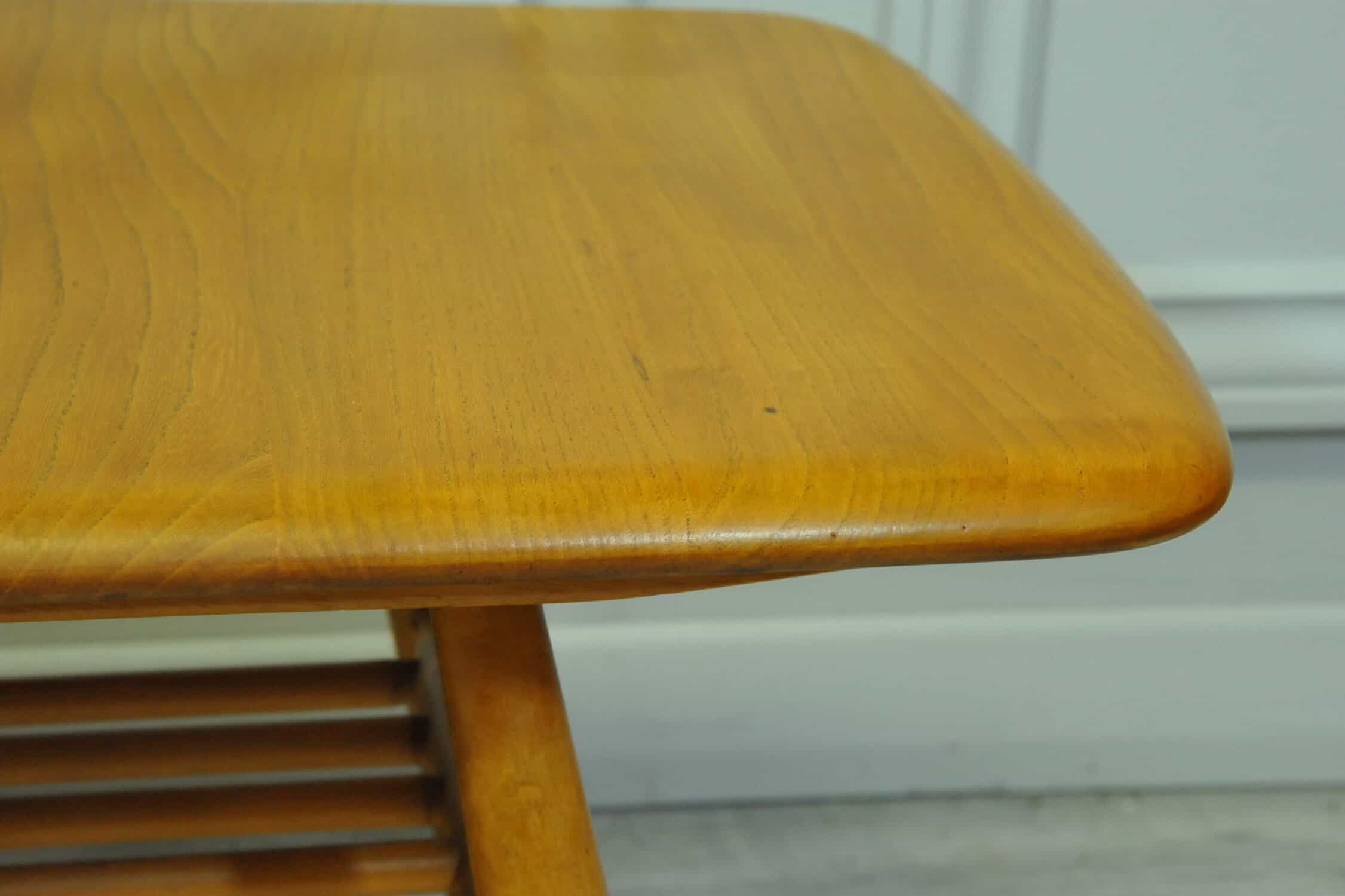 a vintage ercol 398 long coffee table with under shelf