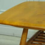 a vintage ercol 398 long coffee table with under shelf