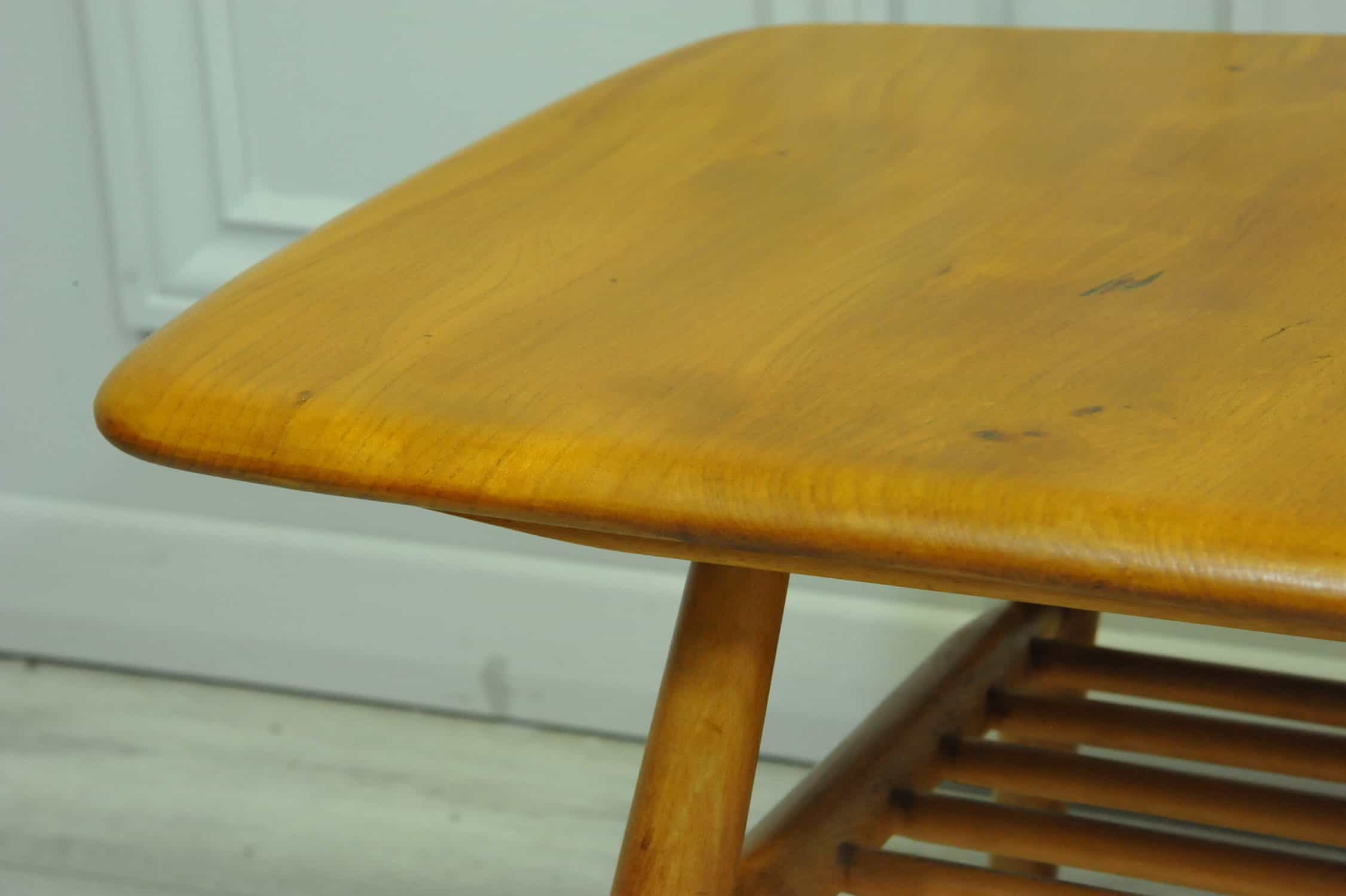 a vintage ercol 398 long coffee table with under shelf