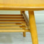 a vintage ercol 398 long coffee table with under shelf