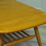 a vintage ercol 398 long coffee table with under shelf