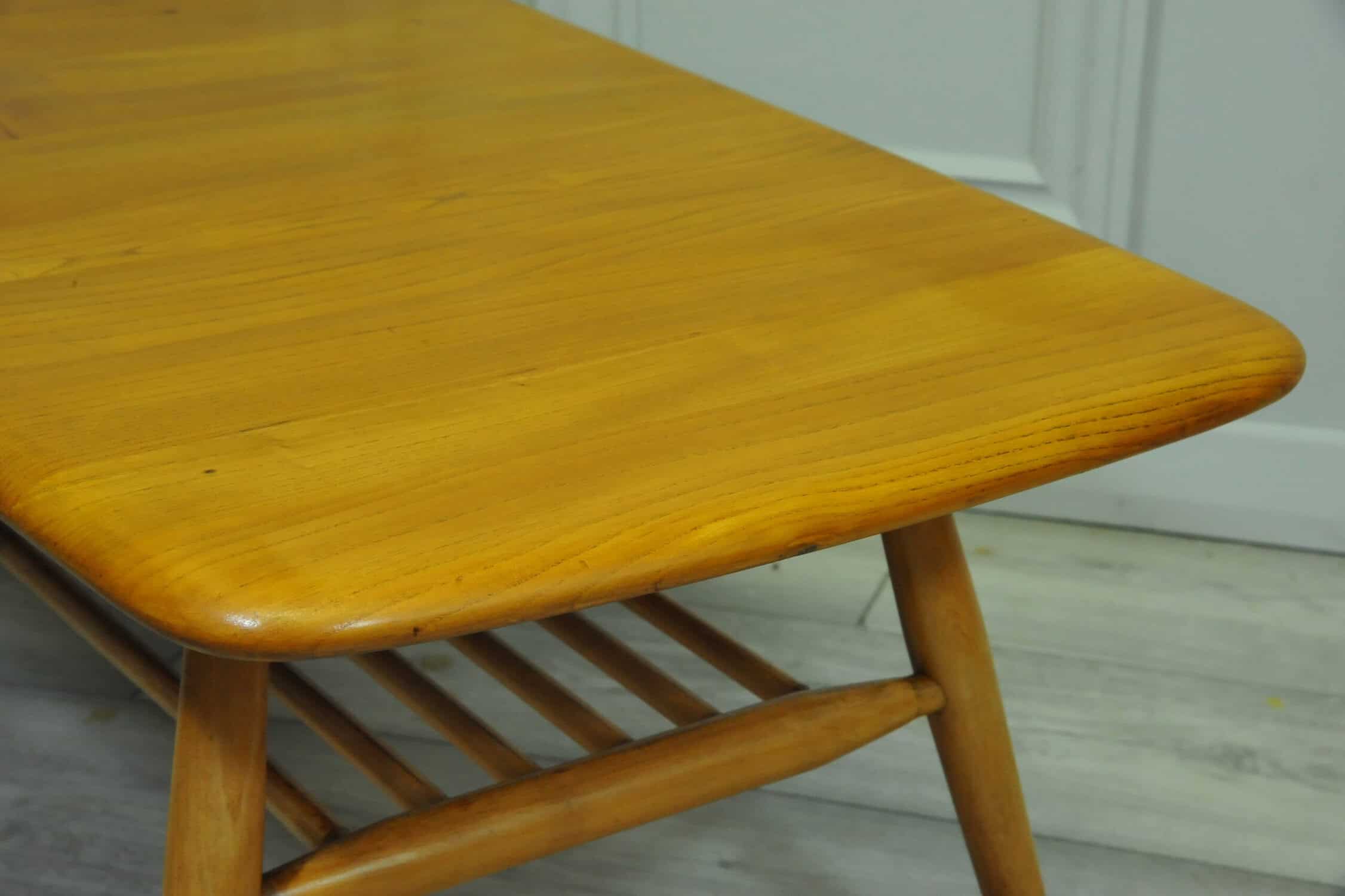 a vintage ercol 398 long coffee table with under shelf