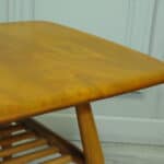 a vintage ercol 398 long coffee table with under shelf