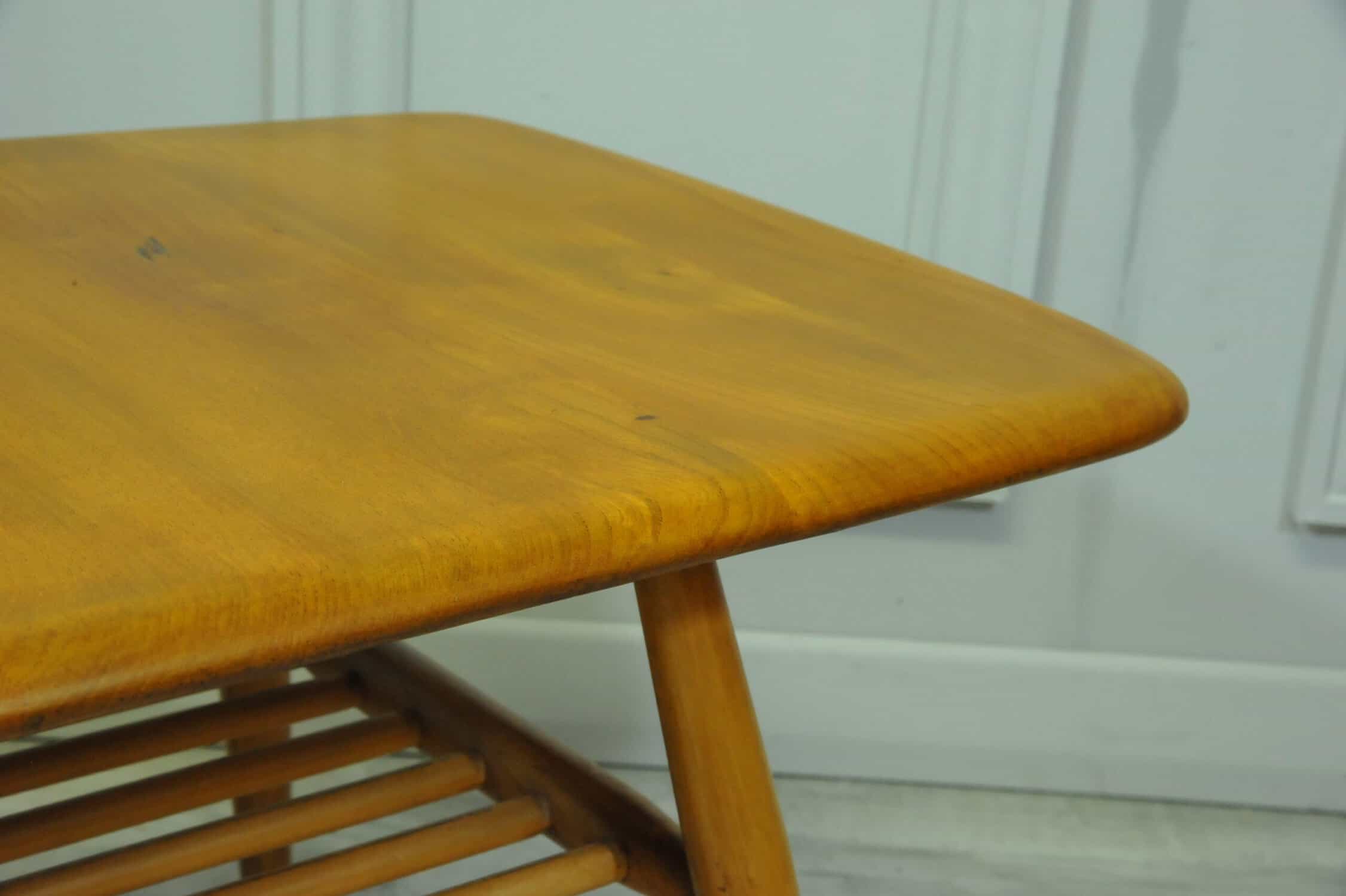 a vintage ercol 398 long coffee table with under shelf
