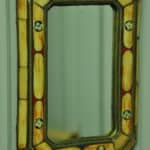 a vintage moroccan bone and brass decorated wall mirror
