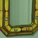a vintage moroccan bone and brass decorated wall mirror
