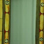 a vintage moroccan bone and brass decorated wall mirror