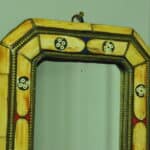 a vintage moroccan bone and brass decorated wall mirror