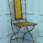 a vintage french faux bamboo folding conservatory chair