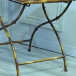 a vintage french faux bamboo folding conservatory chair