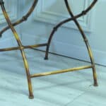 a vintage french faux bamboo folding conservatory chair
