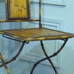 a vintage french faux bamboo folding conservatory chair