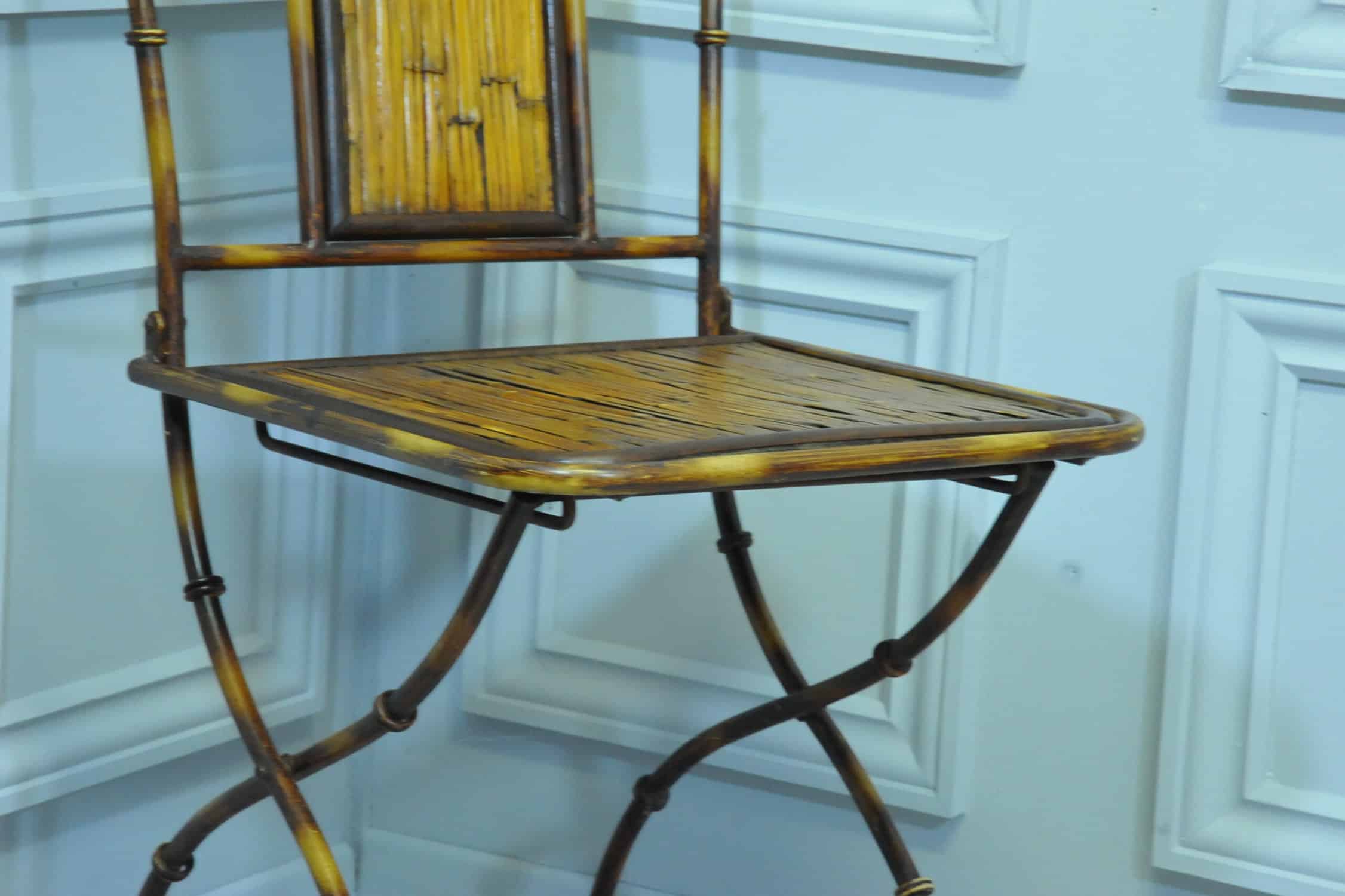 a vintage french faux bamboo folding conservatory chair