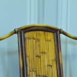 a vintage french faux bamboo folding conservatory chair