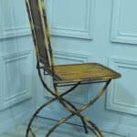 a vintage french faux bamboo folding conservatory chair