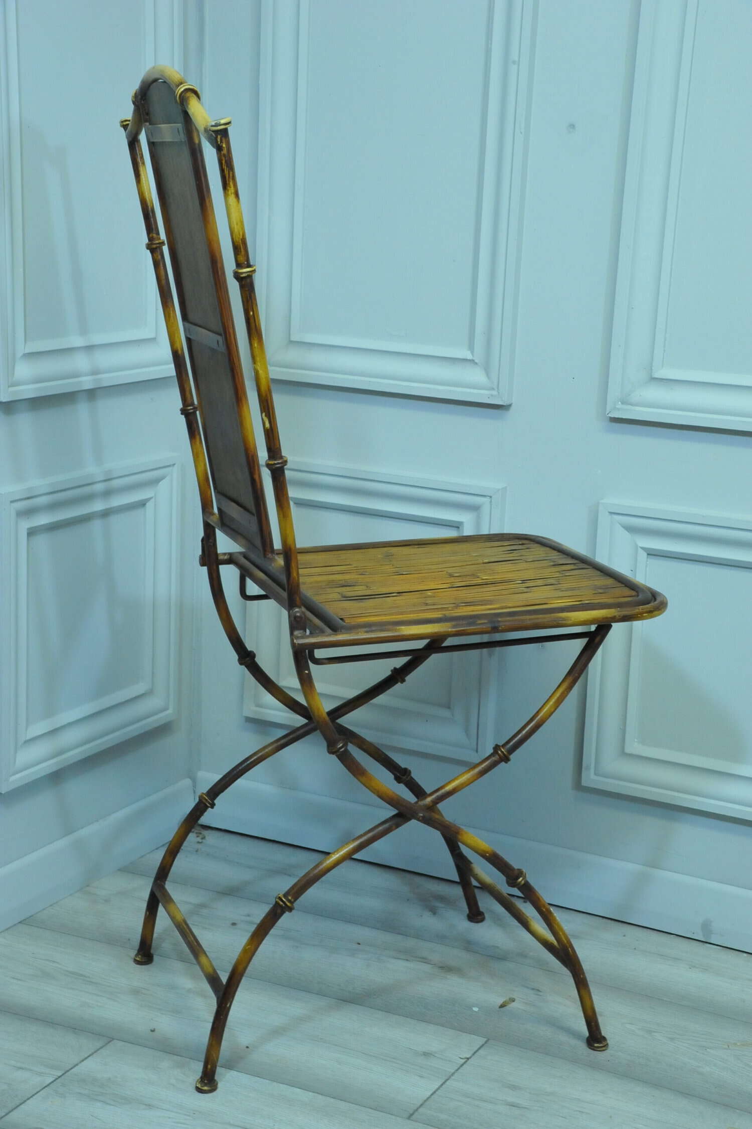a vintage french faux bamboo folding conservatory chair