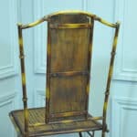 a vintage french faux bamboo folding conservatory chair