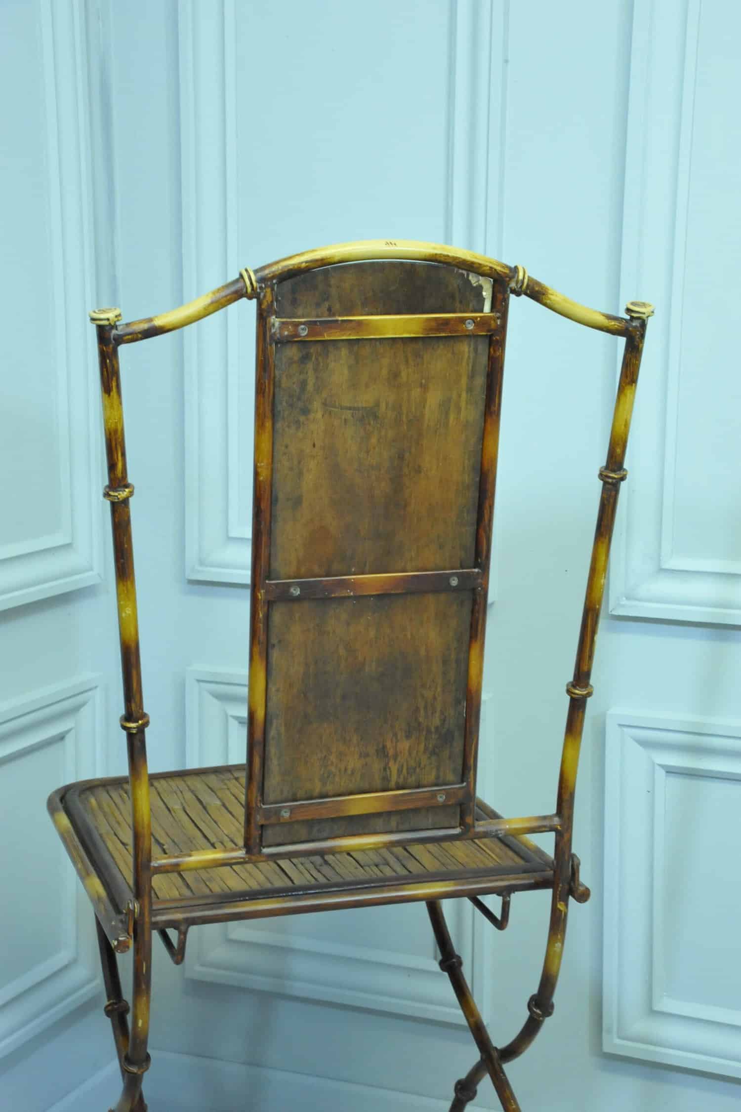 a vintage french faux bamboo folding conservatory chair