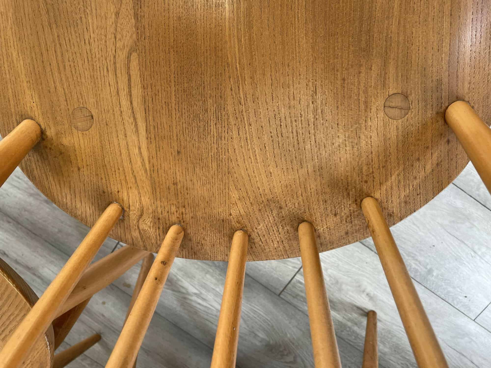 set of eight vintage ercol quaker dining chairs including two swan back carvers