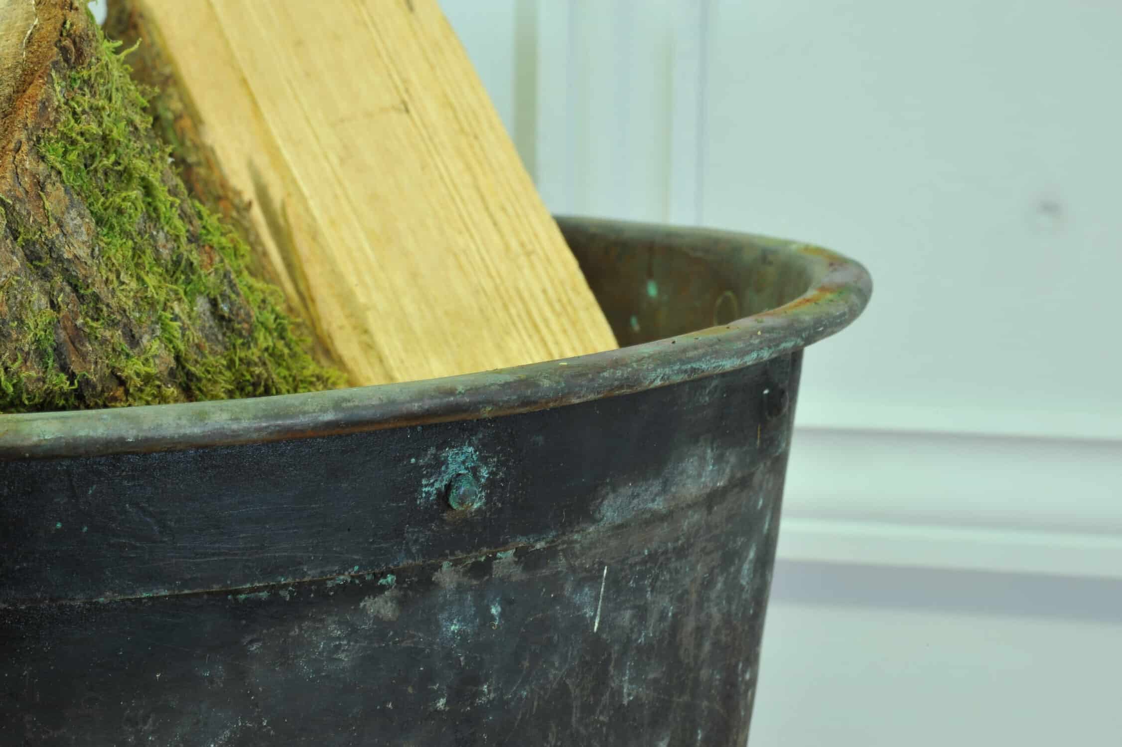 a very large antique french copper cauldron