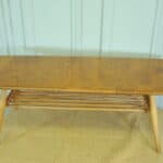 a vintage ercol 398 long coffee table with under shelf