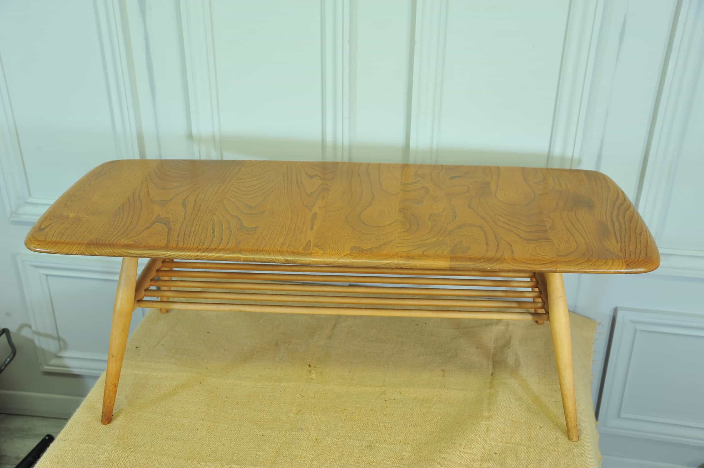 a vintage ercol 398 long coffee table with under shelf